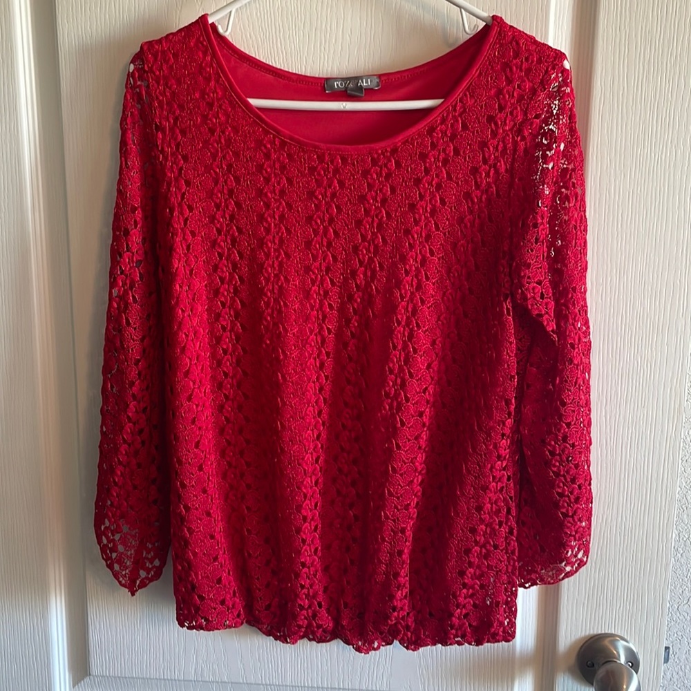 Women’s size medium red half sleeve blouse.